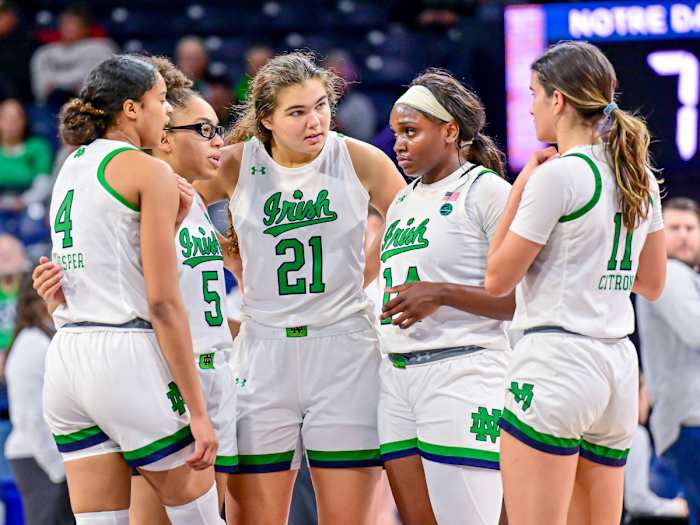 Notre Dame guard Cassandre Prosper, guard Olivia Miles, forward Maddy Westbeld, guard KK Bransford, and guard Sonia Citron huddle in the second half against the Boston College Eagles.